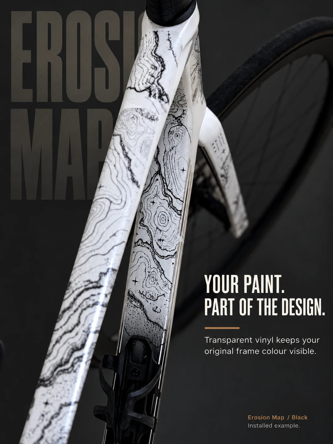 Real installation: Erosion Map in black on a white road-bike frame. Original paint remains visible.